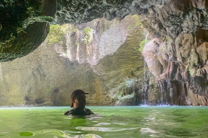 Arenales River Caving, Waterfall &Tropical Forest Secret Spring - Stop 1: Vega Baja river pools, downhill walking, and cave swimming setup