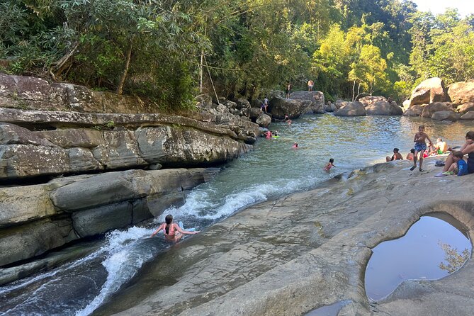 El Yunque Rainforest- Water Slide, Luquillo Beach Guided Tour - The big idea: one guided loop from rainforest to ocean