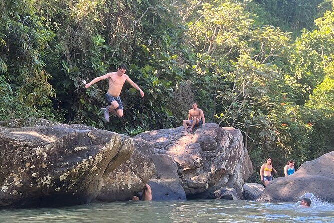 El Yunque Rainforest- Water Slide, Luquillo Beach Guided Tour - Luquillo Beach: calm water after the action, plus kiosks for every appetite