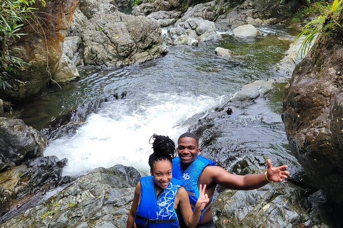 El Yunque Rainforest - Waterslide, Cliff jump, and Rope swing! - Snacks, Photos, and Lunch Stop: What’s Included for $94.99