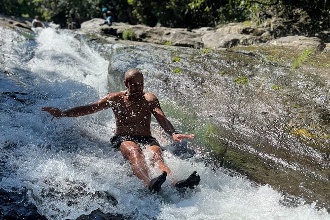 El Yunque Waterslide and Waterfall Tour with Food and Photos - The slide and waterfall segment: adrenaline with instruction