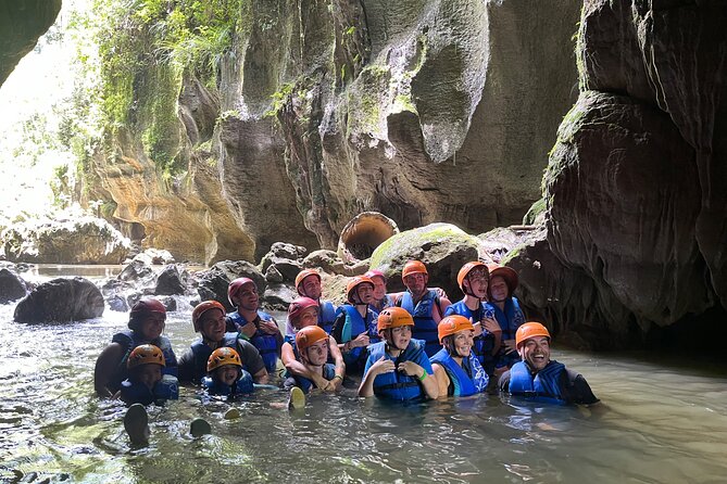 Explore Cuevas Charco Azul, Arenas and Playa de Aguas Cristalinas - Charco Azul cave section: mineral formations, a waterfall, and a chance for a jump