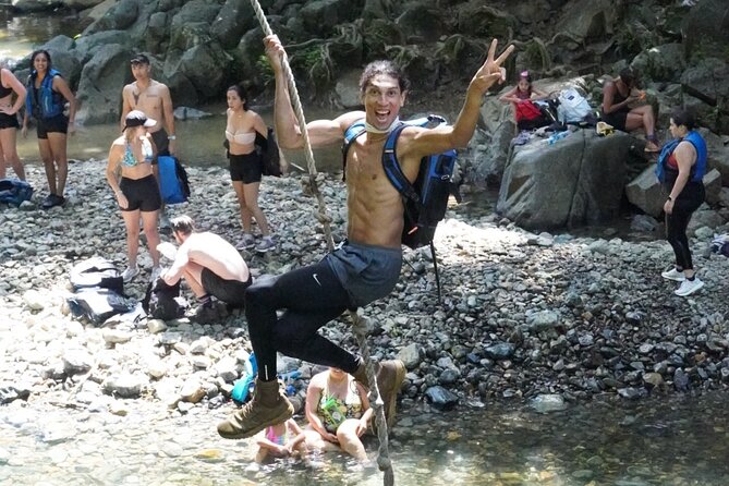 Famous Natural Waterslide in El Yunque Rainforest - Entering El Yunque by way of cliff jumps, slides, and a rope swing