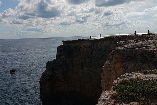 Full Day West Coast Adventure in Puerto Rico - Playa El Combate for real beach time, with the useful gear