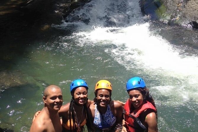 Half-Day Tour: El Yunque, Waterslides, and Luquillo Beach - From San Juan to jungle waterfalls and beach kiosks, in one smooth half day