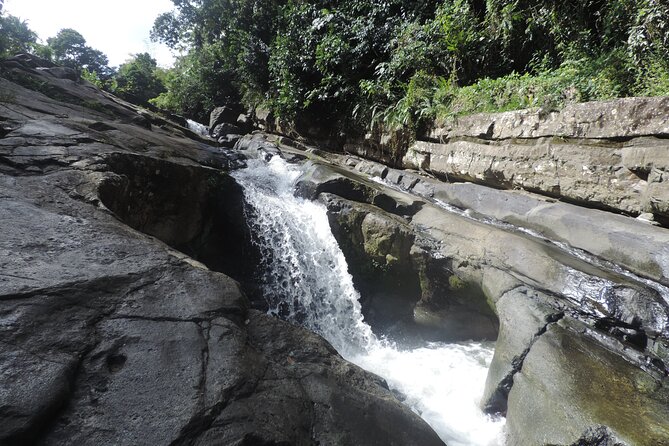 Half-Day Tour: El Yunque, Waterslides, and Luquillo Beach - Luquillo Beach: kioskos, local food, and the easy way to finish strong