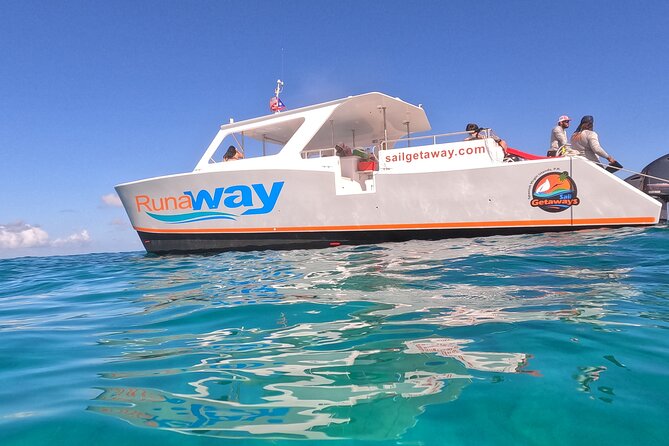 Icacos Double Dip Power Catamaran Snorkel & Beach Tour - Icacos beach time: swimming, sun, and a slower pace