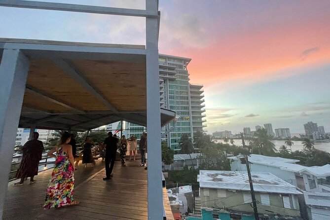 Learn Salsa in San Juan - Vivid beginner lesson - The Rooftop Sunset Moment and the Included Drink