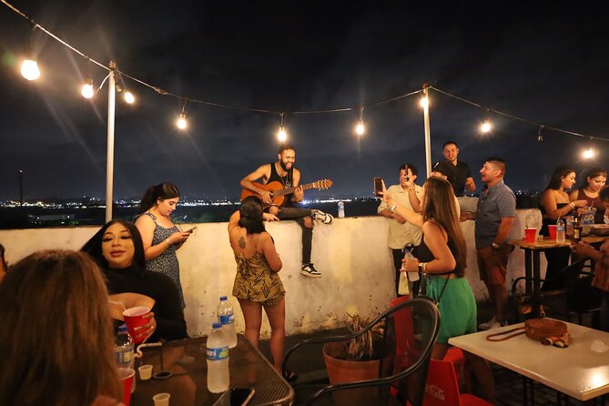 Old San Juan Bar Crawl: Experience Local Hotspots - Entering Old San Juan nightlife from Calle San Sebastián