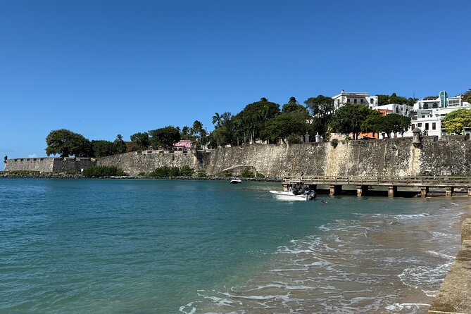 Old San Juan Food Tour with 7 Tastings of Authentic Local Flavors - La Casa Estrecha and the Catedral Basilica: tiny house stories and the big church moment