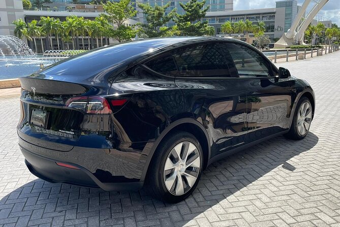 Puerto Rico Island Wide Transfer, Tesla Y Luxury SUV, Select Zone - Where the driver meets you: airport, cruise, and door-to-door ease