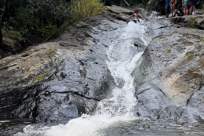 Rainforest Adventure All inclusive Food and Fotos - Guides are the safety system on wet rocks (and it shows)