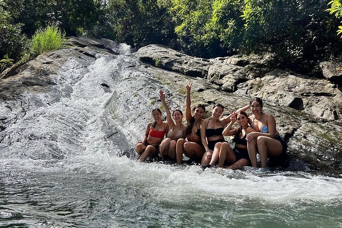 Rainforest Waterfall Slides/Adult Drinks included/ Beach - A 5-hour San Juan mix of rainforest slides and beach time