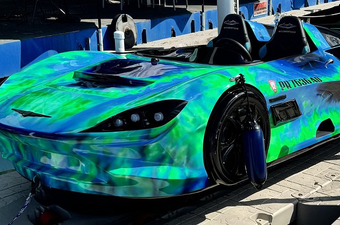 San Juan PR Watersports Car Rental Green McLaren - San Juan Bay Marina Check-In Under Sizzler Restaurant