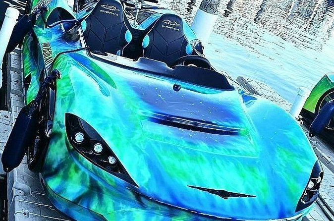San Juan PR Watersports Car Rental Green McLaren - The Jet Car Ride Setup: Life Vest, Waiver, and Saltwater Goggles