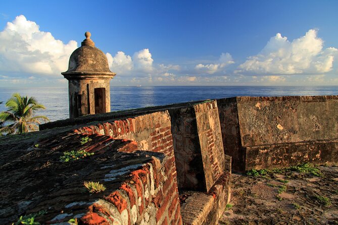 San Juan Self-Guided Walking Audio Tour - Casino Building and Plaza Colón: Pastel Grandeur Meets Big Symbolism