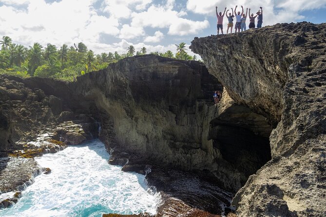 Taino Indian Cave, Arecibo Hike and Beach Tour from San Juan - La Poza Del Obizpo beach stop: warm water, clear views, and some wave reality